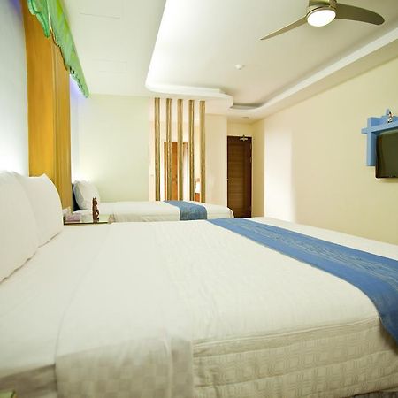 Millennium Inn Kenting Rum bild